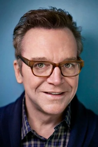 Chân dung Tom Arnold