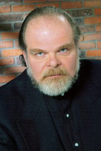 Chân dung George Buza