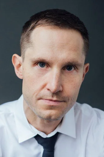 Chân dung Michael Koras