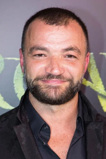 Chân dung Nick E. Tarabay