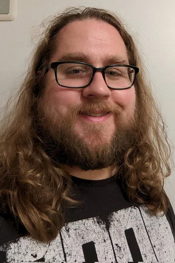 Chân dung David Szymanski