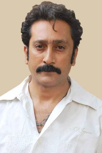 Chân dung Mukesh Tiwari