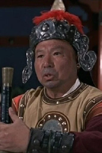 Chân dung Gam Tin-Chue