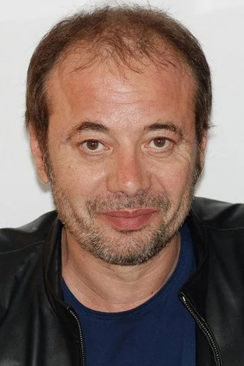 Chân dung Alain Beigel