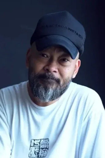 Chân dung Eric Kot Man-Fai