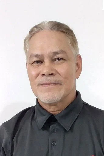 Chân dung Archie Adamos