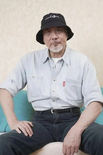 Chân dung Norman Tsui Siu-Keung