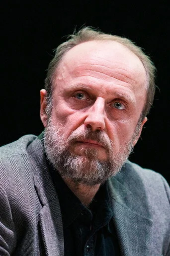 Chân dung Łukasz Simlat